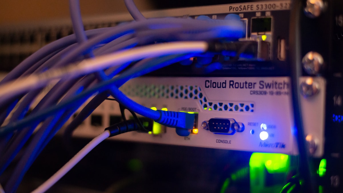 Network switch with ethernet cables connected in a server rack